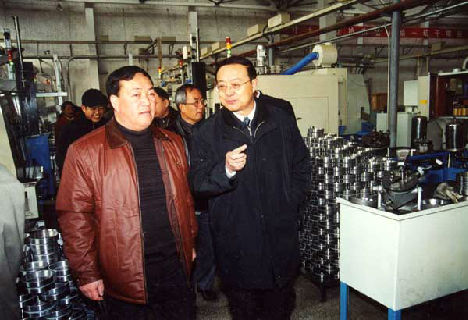 时任国防科工委三线协调中心主任吉大伟来公司考察调研